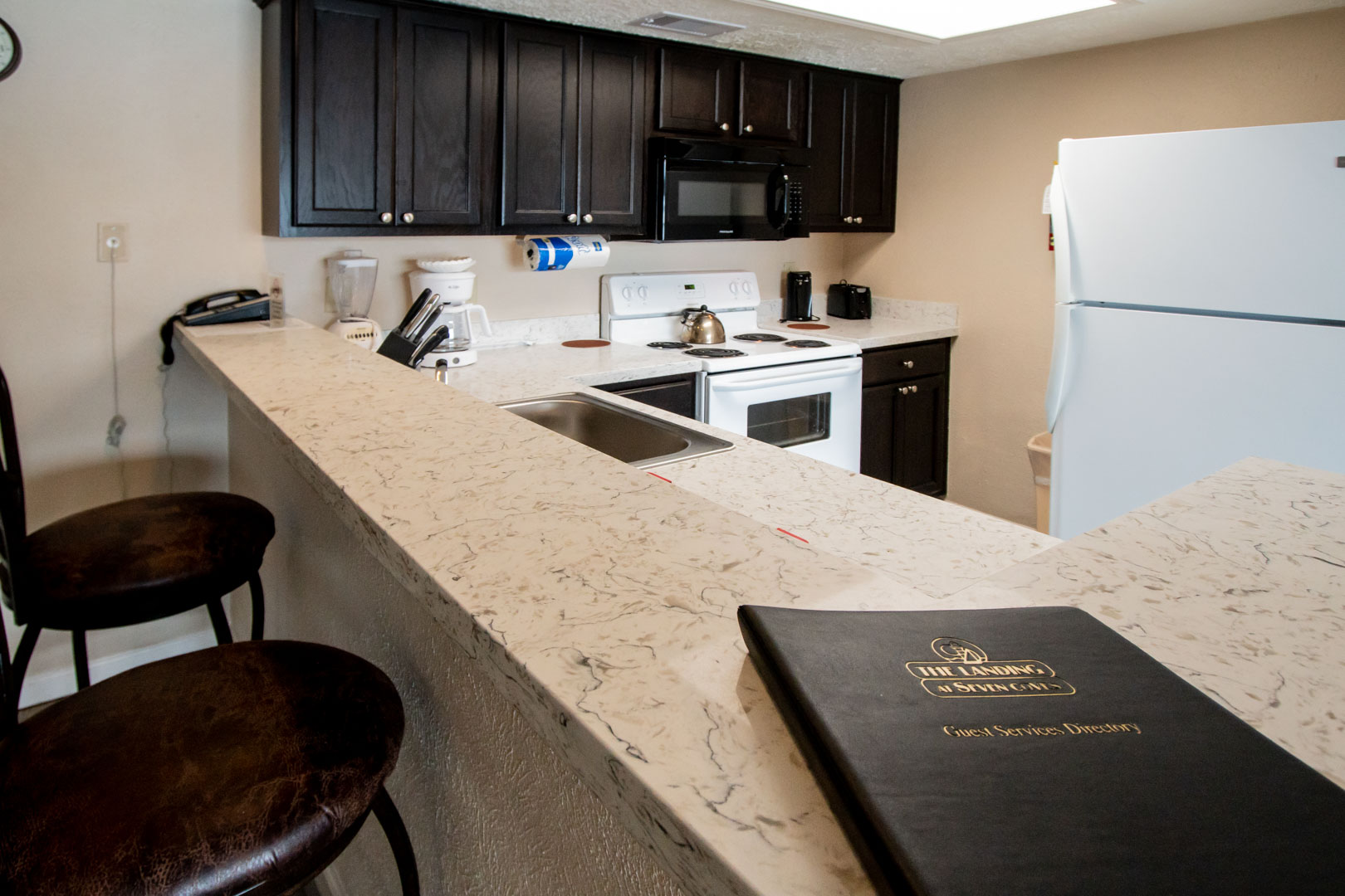A spacious and fully equipped kitchen at VRI's The Landing at Seven Coves in Willis, Texas.